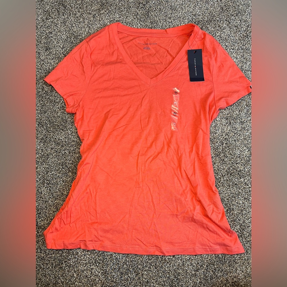Tommy Hilfiger women’s peach/orange short sleeve T-shirt size (M) new with tag.